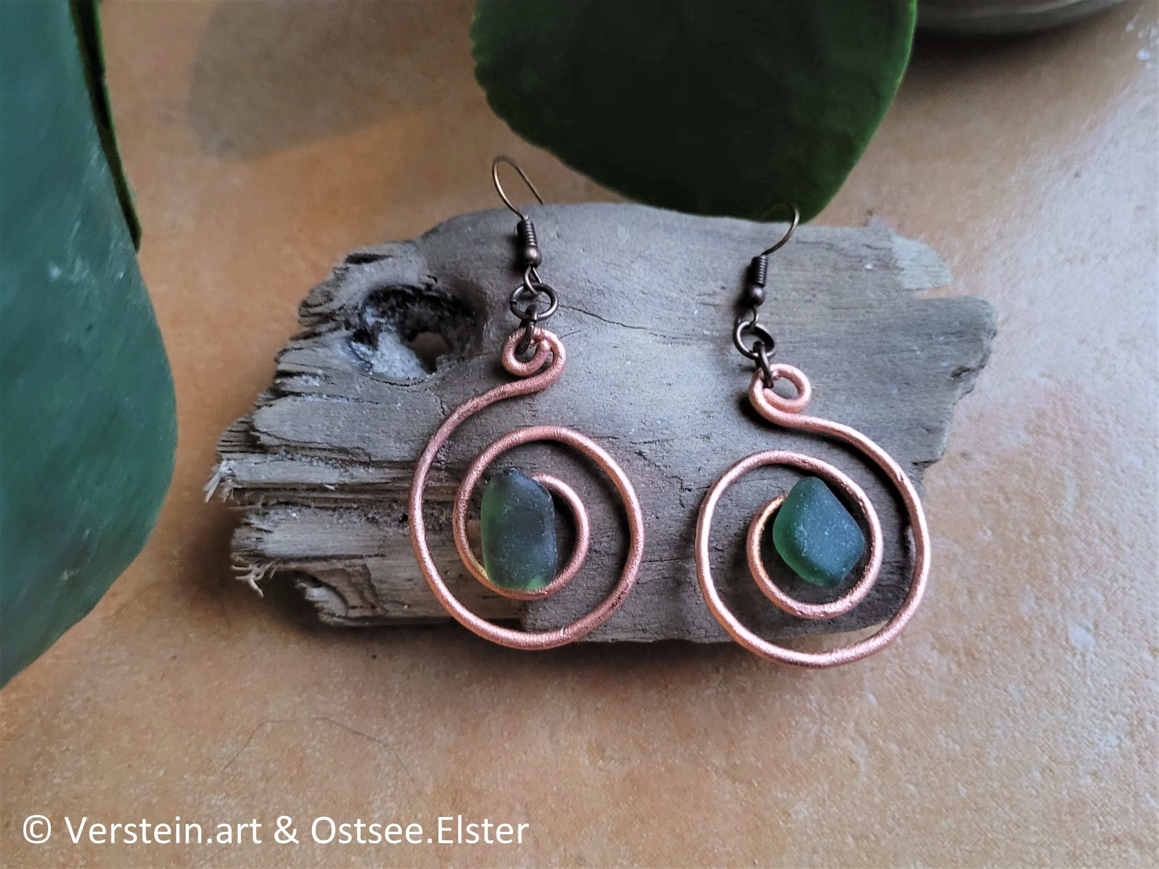 Ohrringe verkupfert